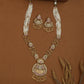 Dual texture kundan long haara with pearl bunch upper links and flowing bead drop chains