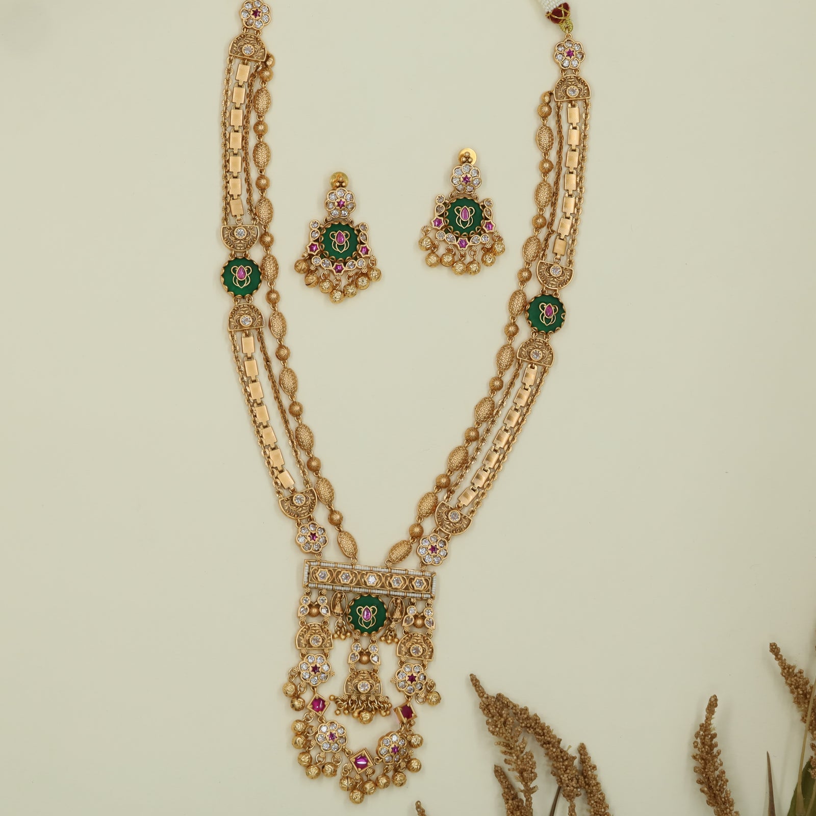 Beaded dual line kundan long haara with side connector accents and layered fringe base