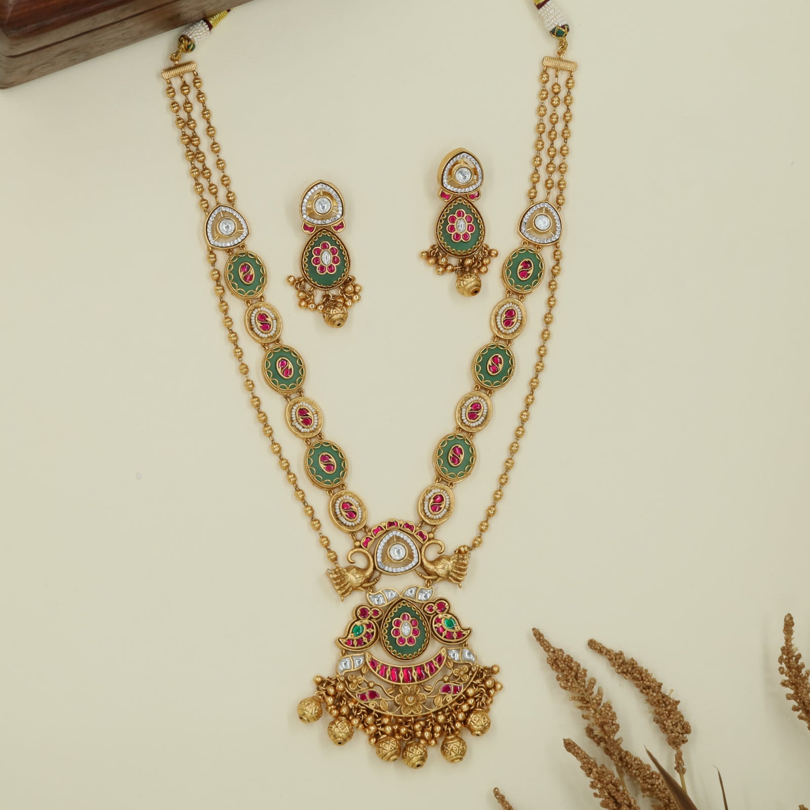 Connector panel kundan long haara with dual strands and temple style pendant