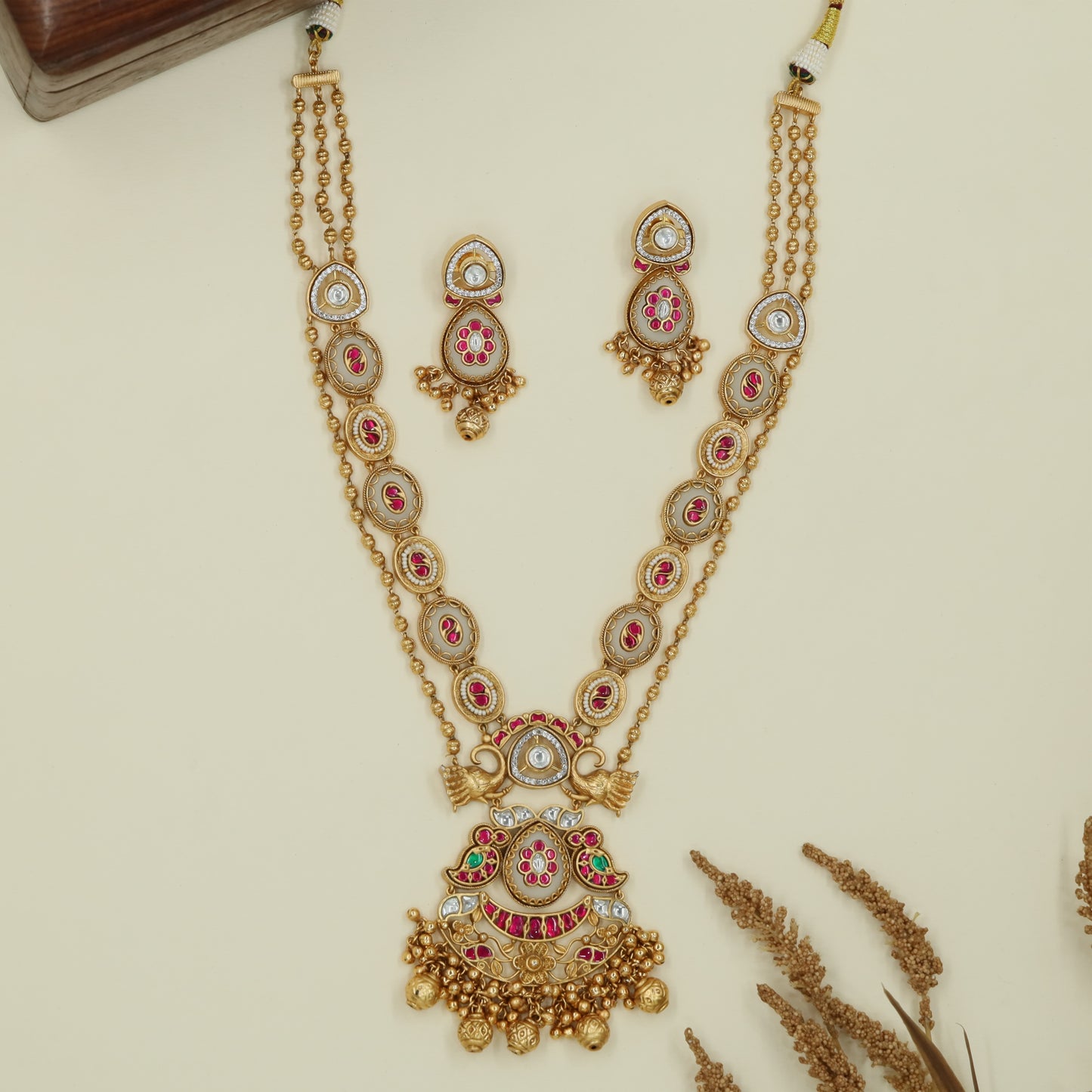 Connector panel kundan long haara with dual strands and temple style pendant