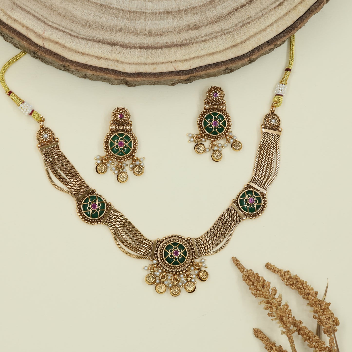 Floral panel kundan necklace with mesh strands and circular connectors with fringe drops
