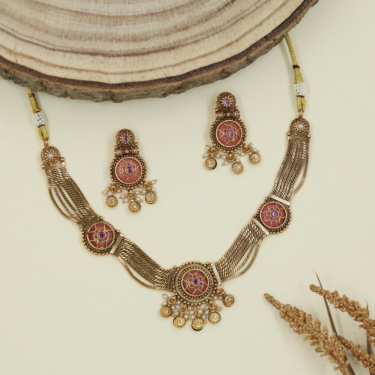 Floral panel kundan necklace with mesh strands and circular connectors with fringe drops