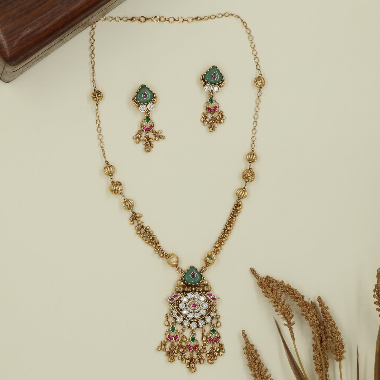 Concentric disc pendant kundan long haara with cluster fringe