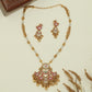 Swan panel kundan long haara with segmented beads and layered drop pendant