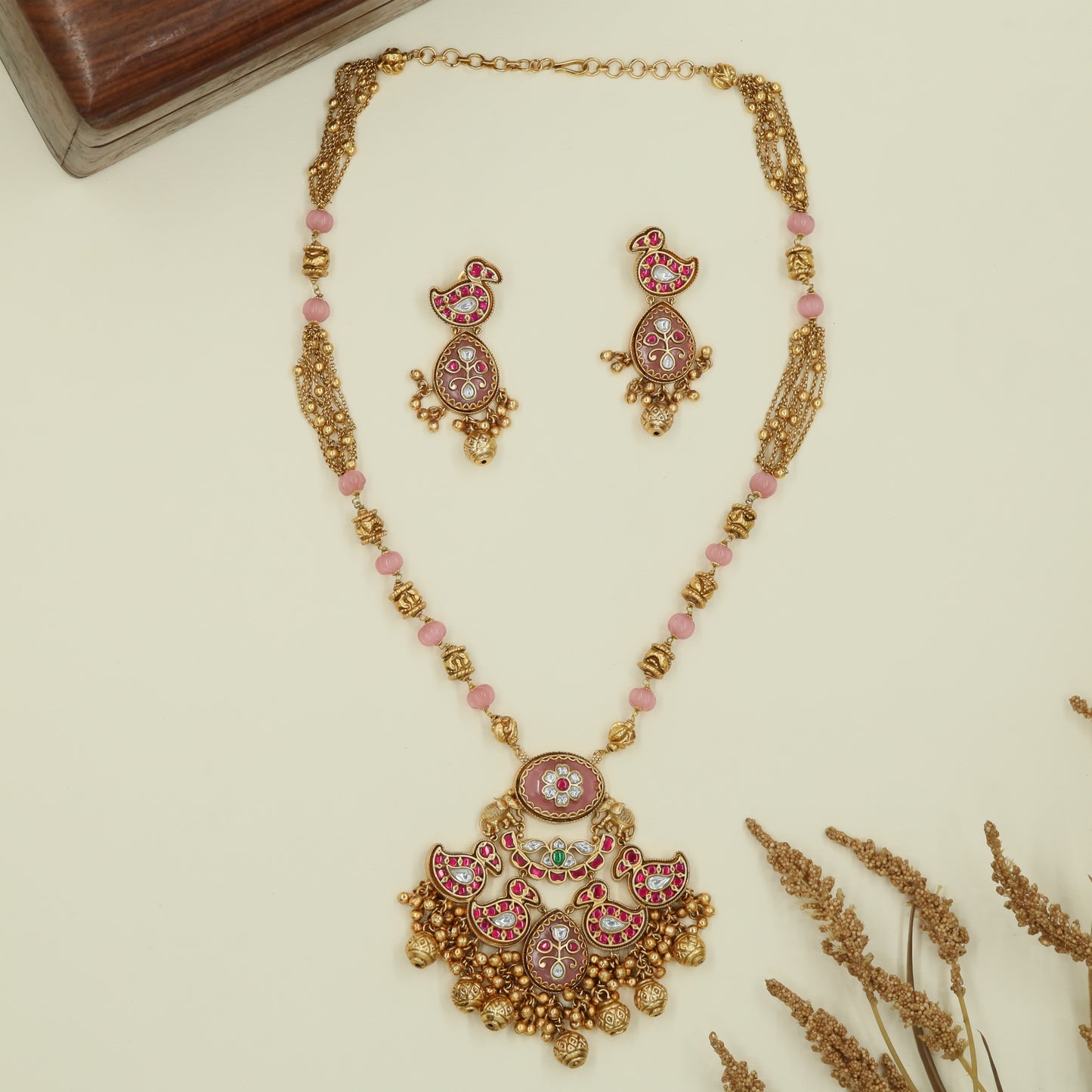 Swan panel kundan long haara with segmented beads and layered drop pendant