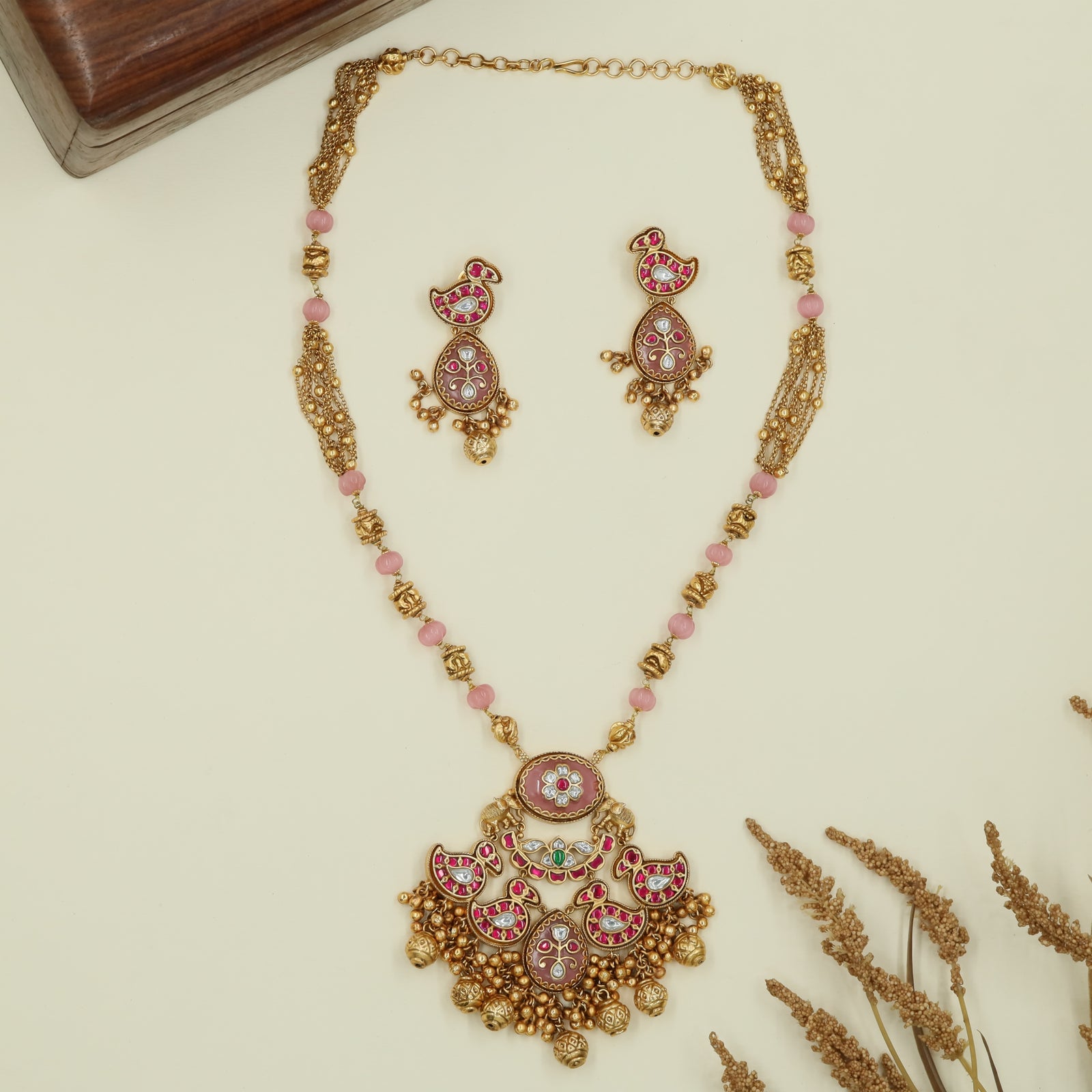 Swan panel kundan long haara with segmented beads and layered drop pendant