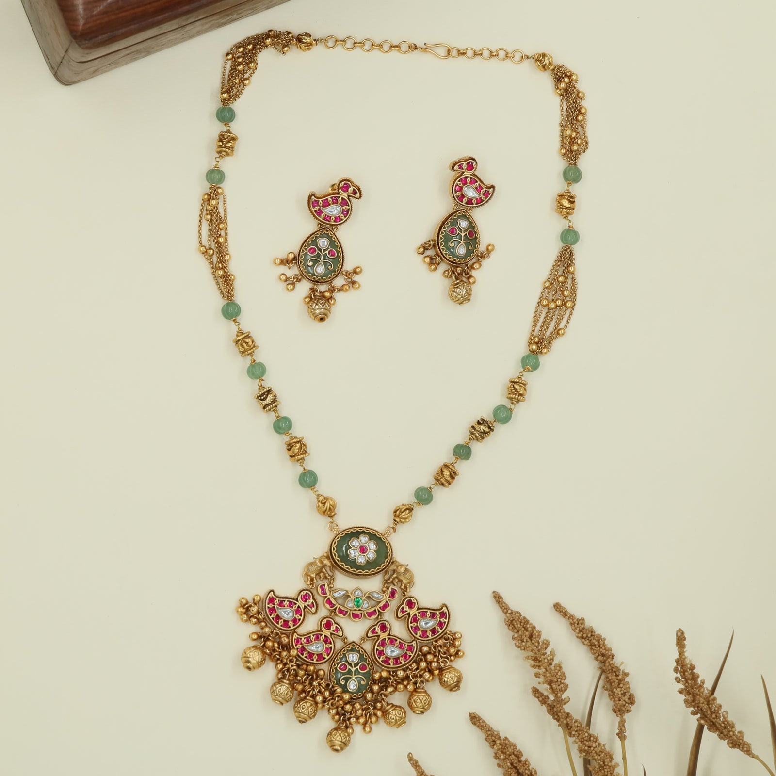 Swan accent kundan long haara with spaced bead chain and clustered drop pendant