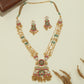 Multi strand kundan long haara with spaced oval beads and grand drop centerpiece