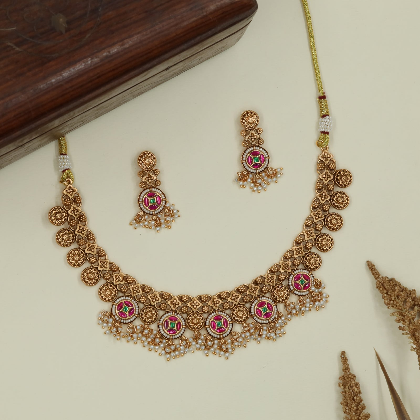 Beaded border antique necklace with circular medallion row and drop clusters