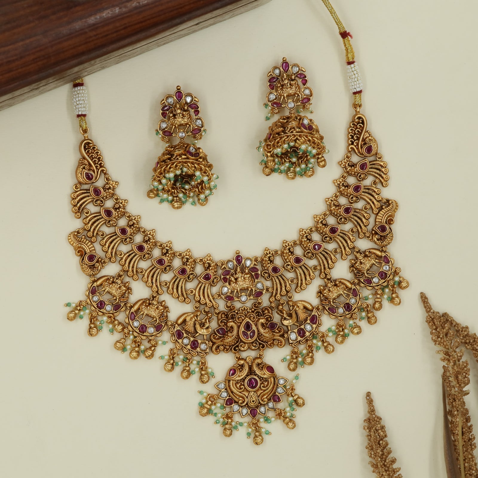 Arched peacock antique necklace with central Lakshmi pendant
