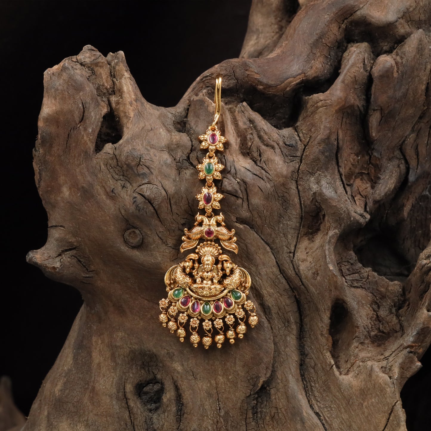 Beaded Lakshmi tikka with layered crest and hanging bead tassels