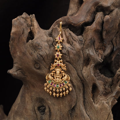 Beaded Lakshmi tikka with layered crest and hanging bead tassels