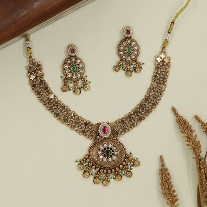 Flower lattice kundan necklace with repeating units and fringe drop pendant