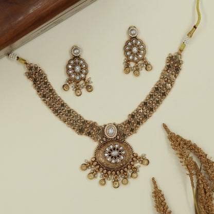 Flower lattice kundan necklace with repeating units and fringe drop pendant