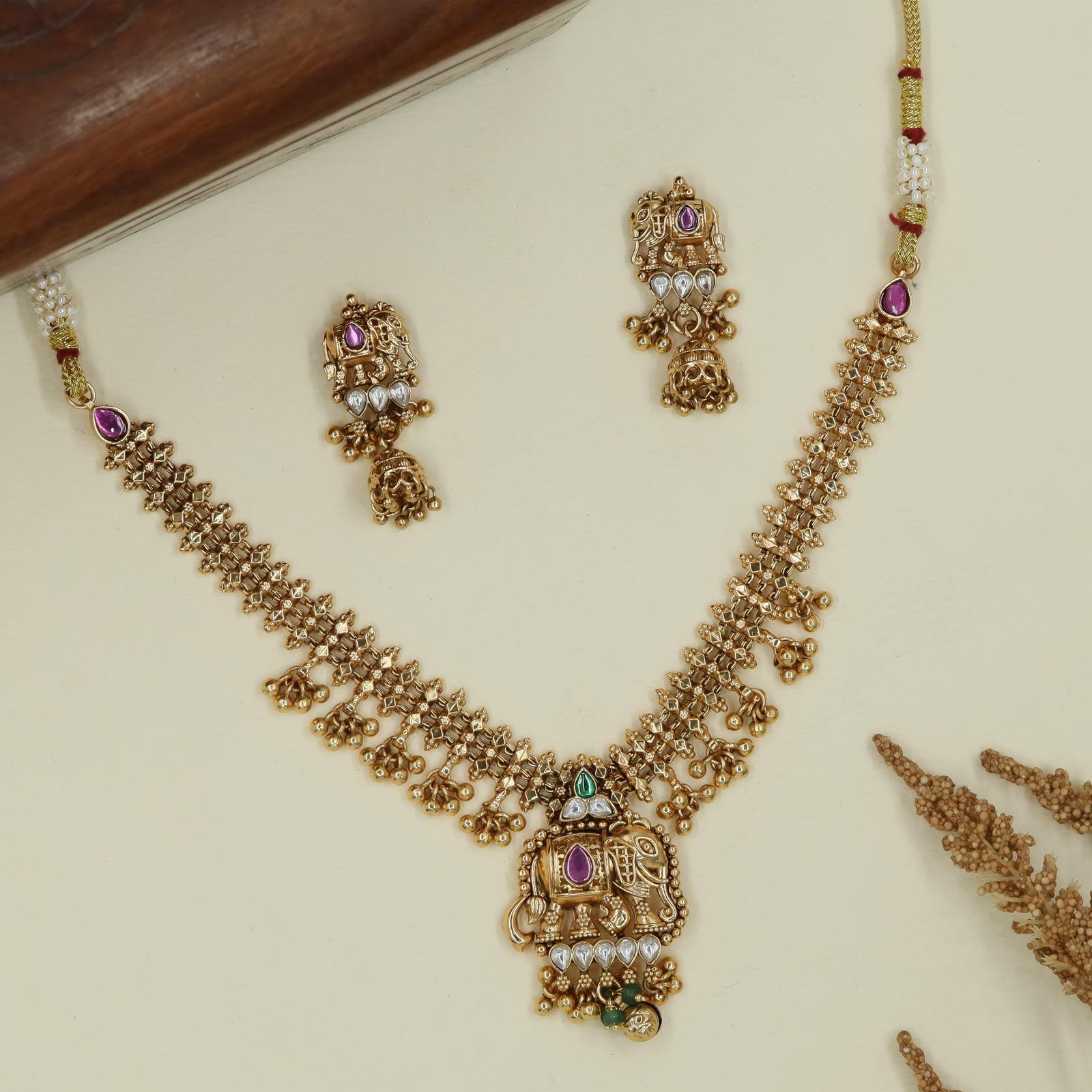 Structured mesh link antique necklace with sculpted elephant pendant and drop fringe