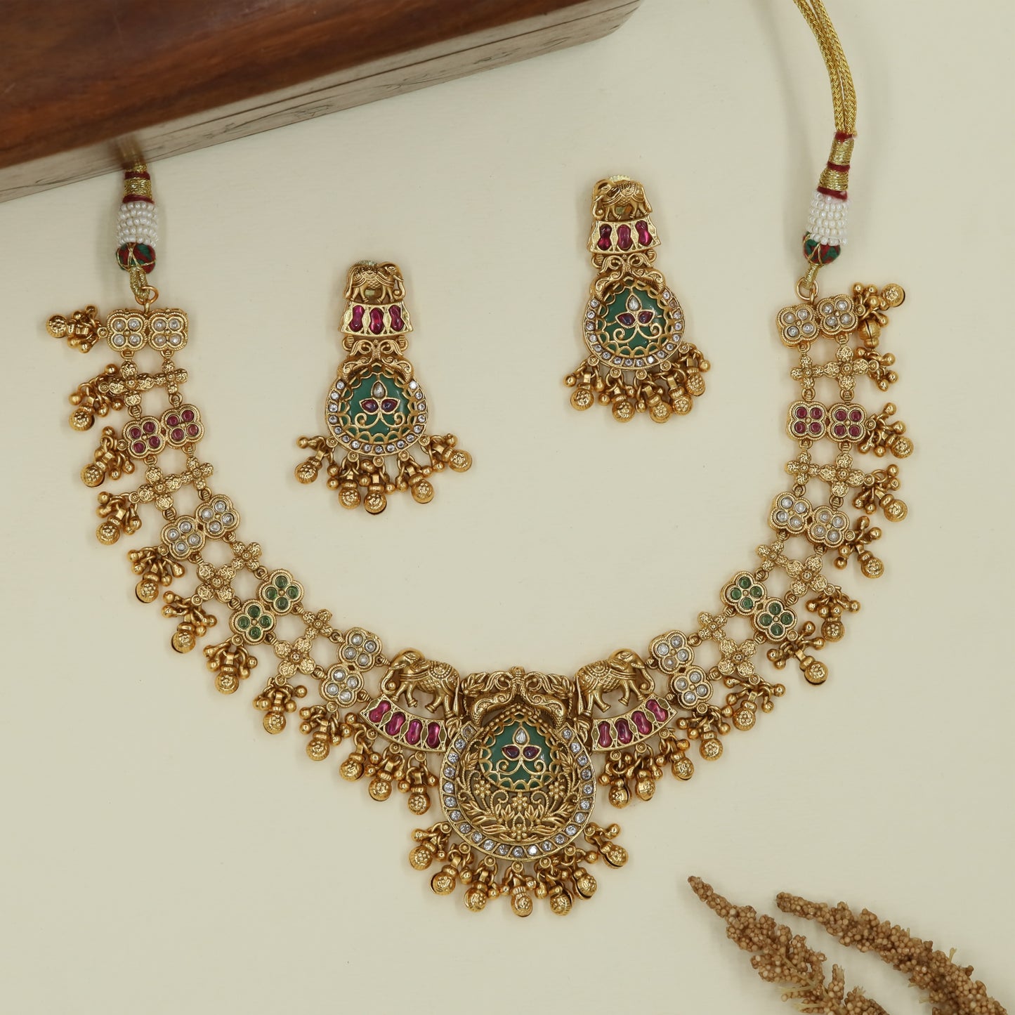 Elephant accent kundan necklace with petal chain and layered pendant fringe