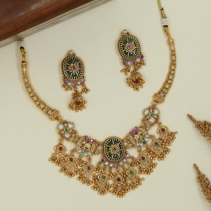 Elephant crest kundan necklace with petal connectors and layered fringe pendant