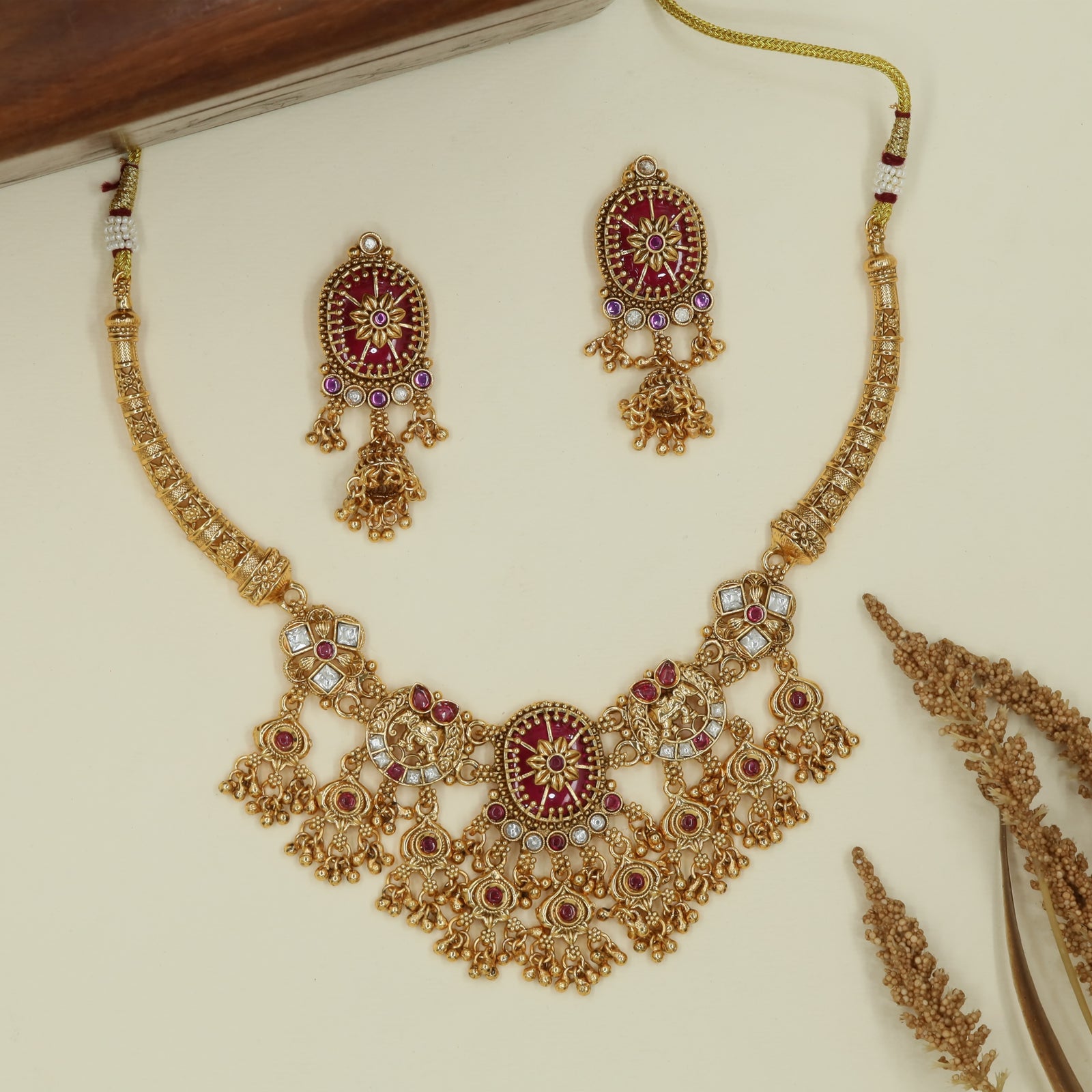 Elephant crest kundan necklace with petal connectors and layered fringe pendant