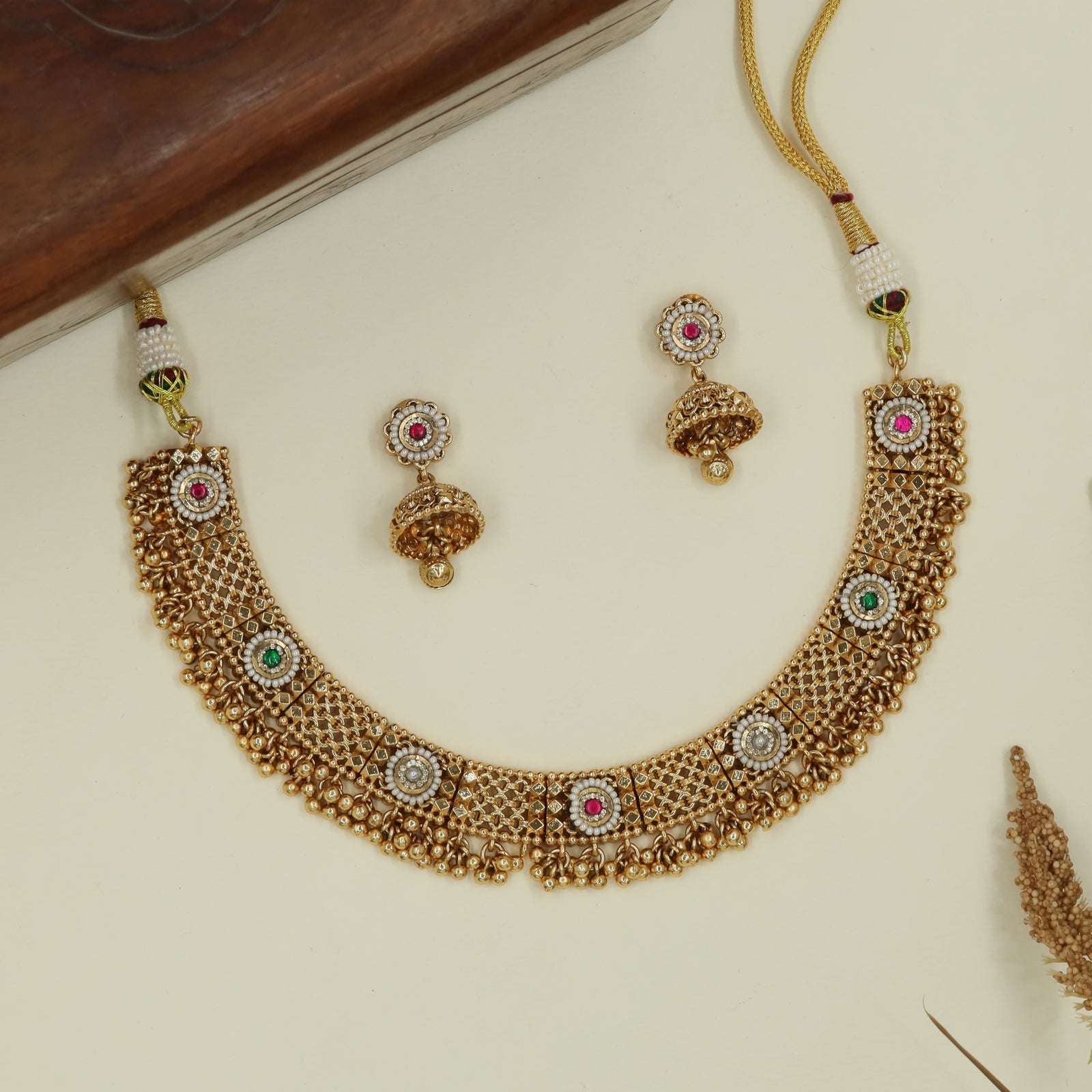 Mesh panel kundan necklace with circular stone stations and dense bead fringe