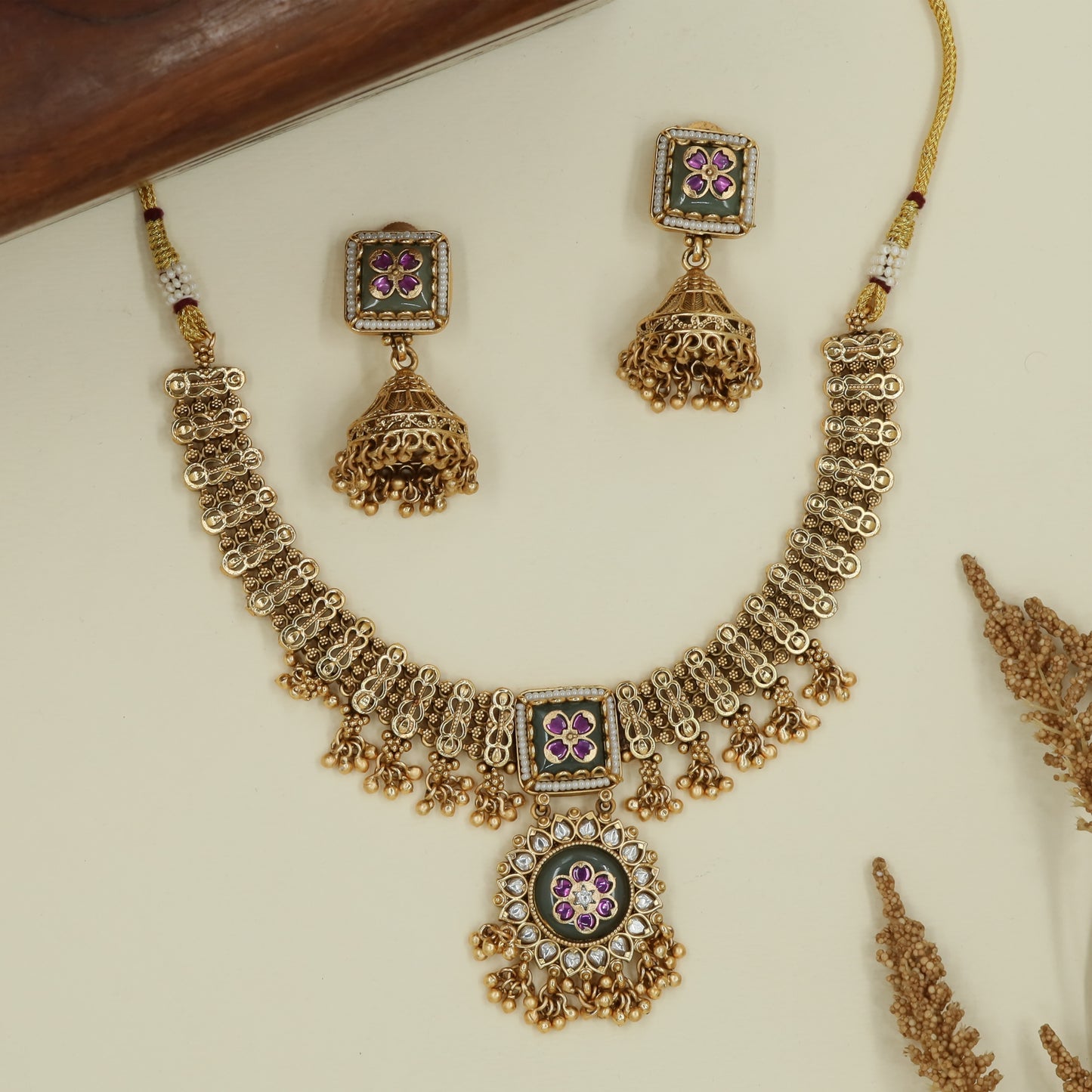 Box frame kundan necklace with repeating loop connectors and fringe drops