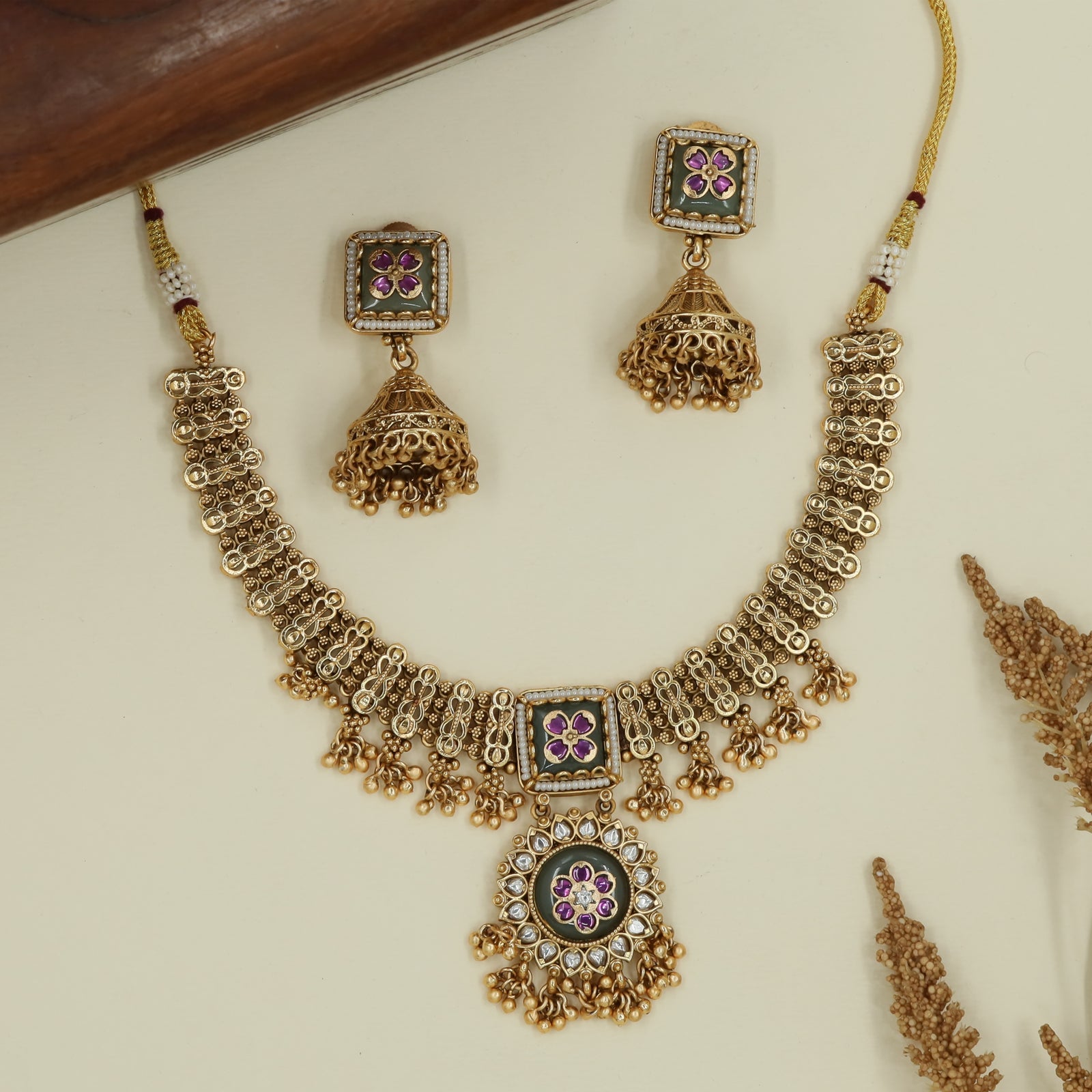 Box frame kundan necklace with repeating loop connectors and fringe drops