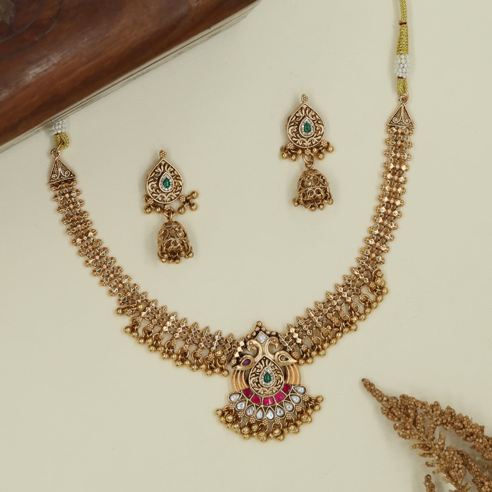 Zig link kundan necklace with tight mesh layering and ornate central unit