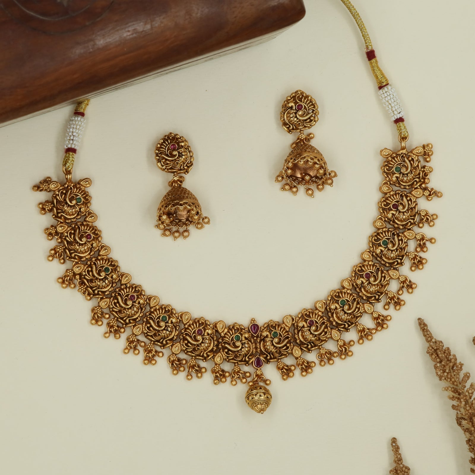 Rosette panel antique necklace with embossed floral units and bead fringe