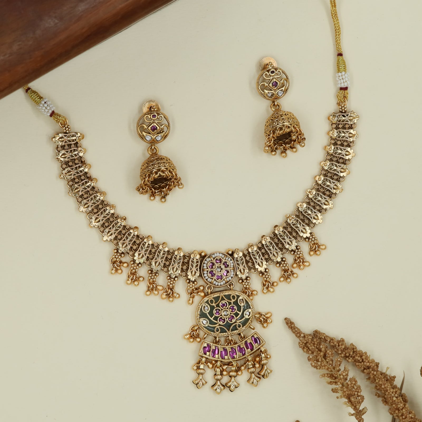 Interlock chain kundan necklace with mesh panels and hanging bead clusters