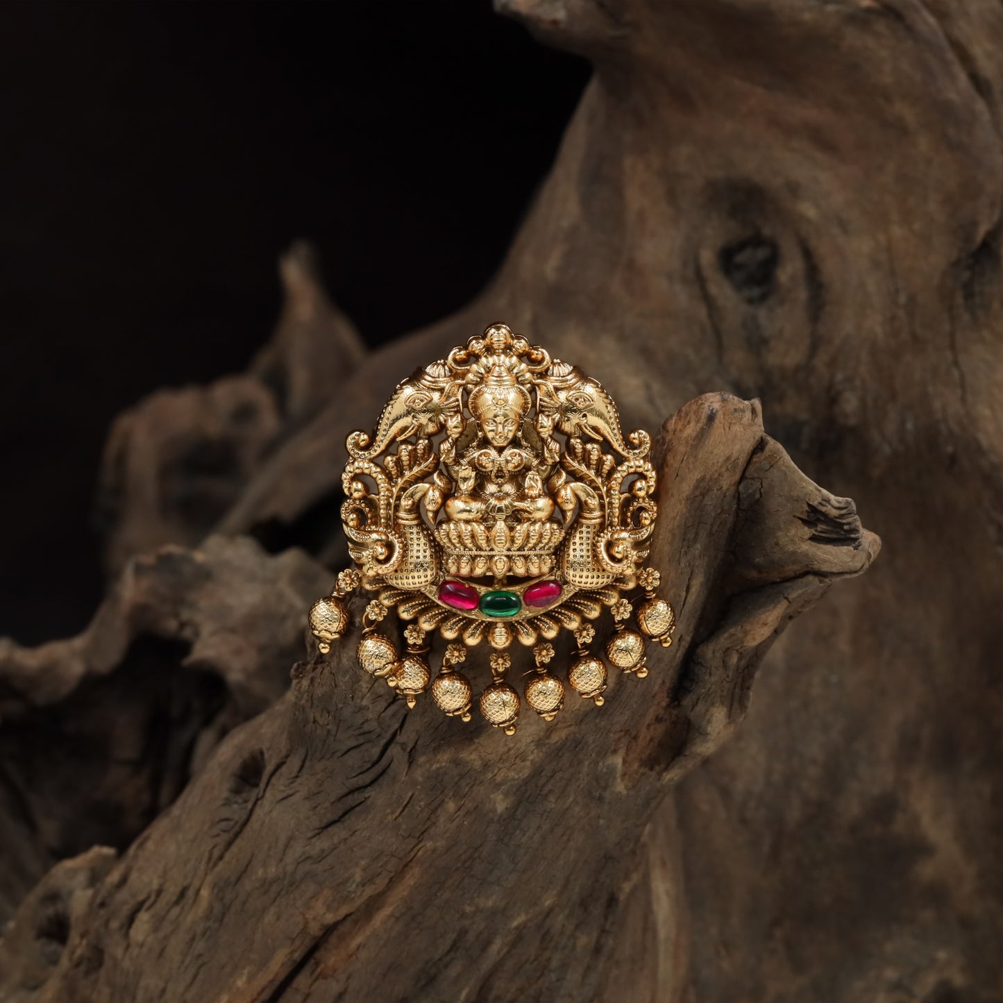 Traditional temple arch jade bille with seated Lakshmi and bead fringe detailing
