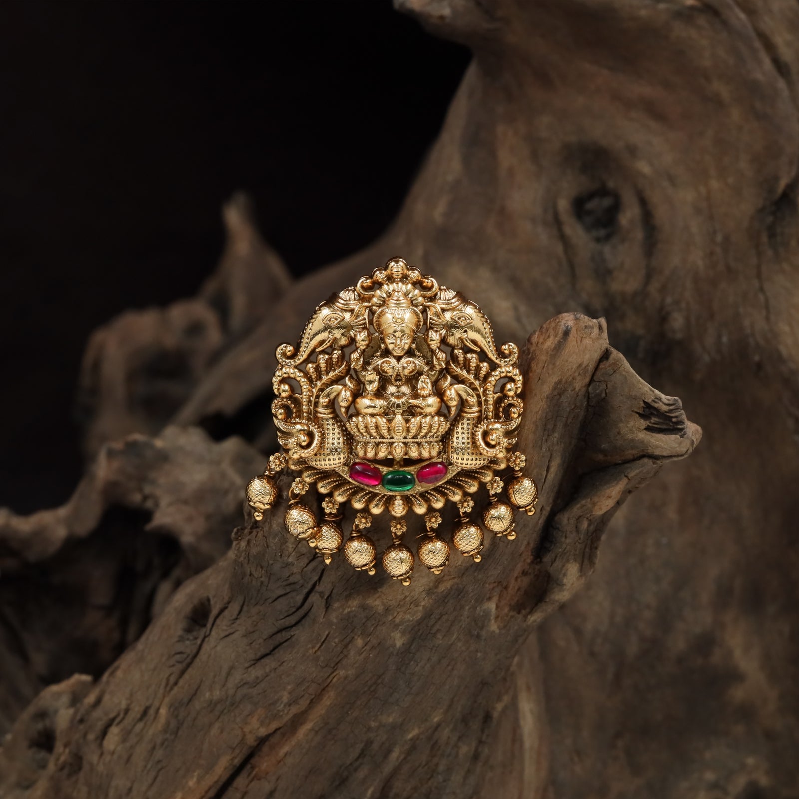 Traditional temple arch jade bille with seated Lakshmi and bead fringe detailing