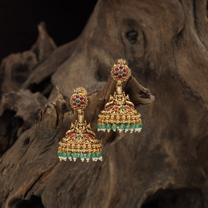 Floral stud jumka with deity link and multi tier dome with hanging bead rows
