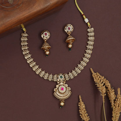 Flat link kundan necklace with consistent segments and hanging pendant finish