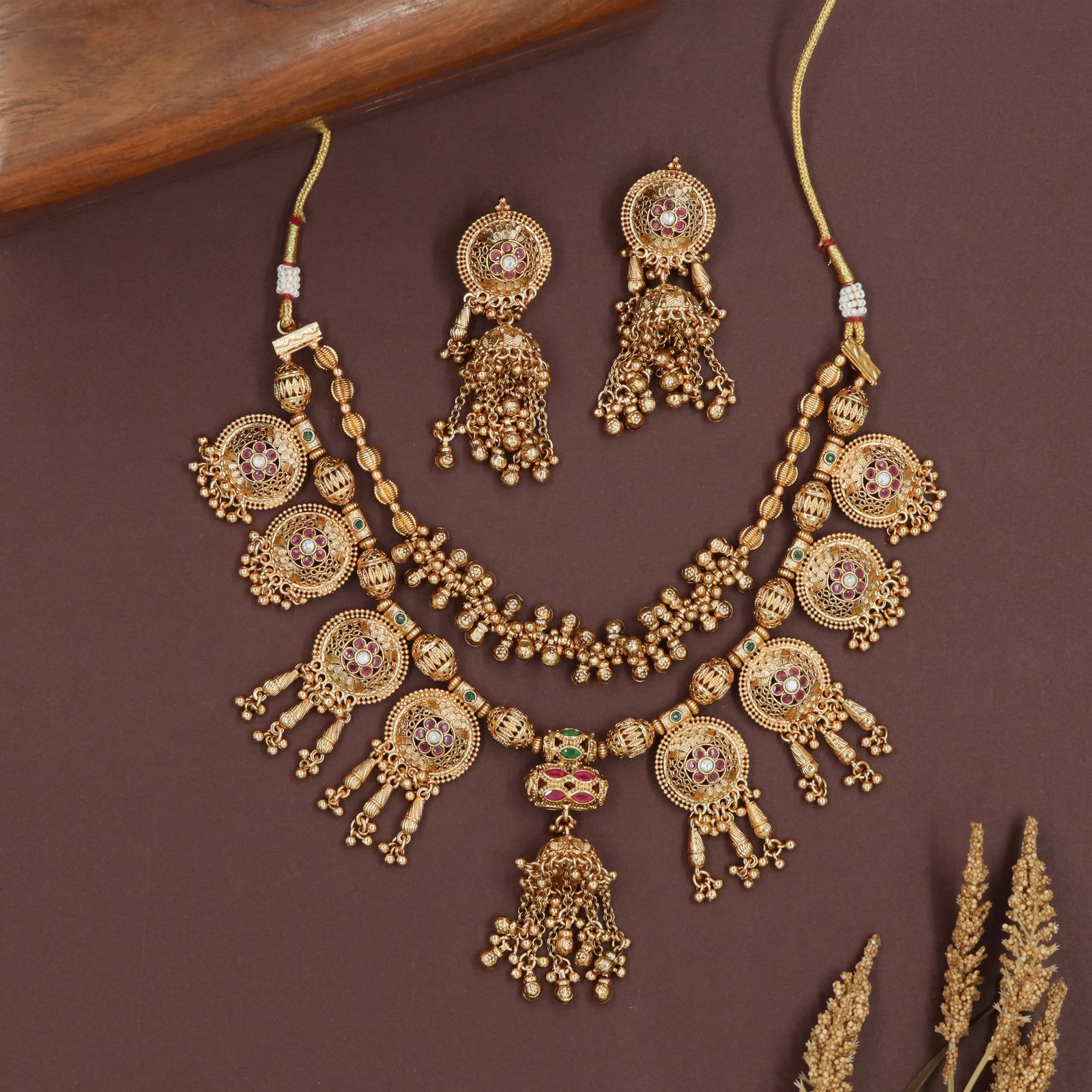 Segmented chain antique necklace with textured beads and disc drop attachments