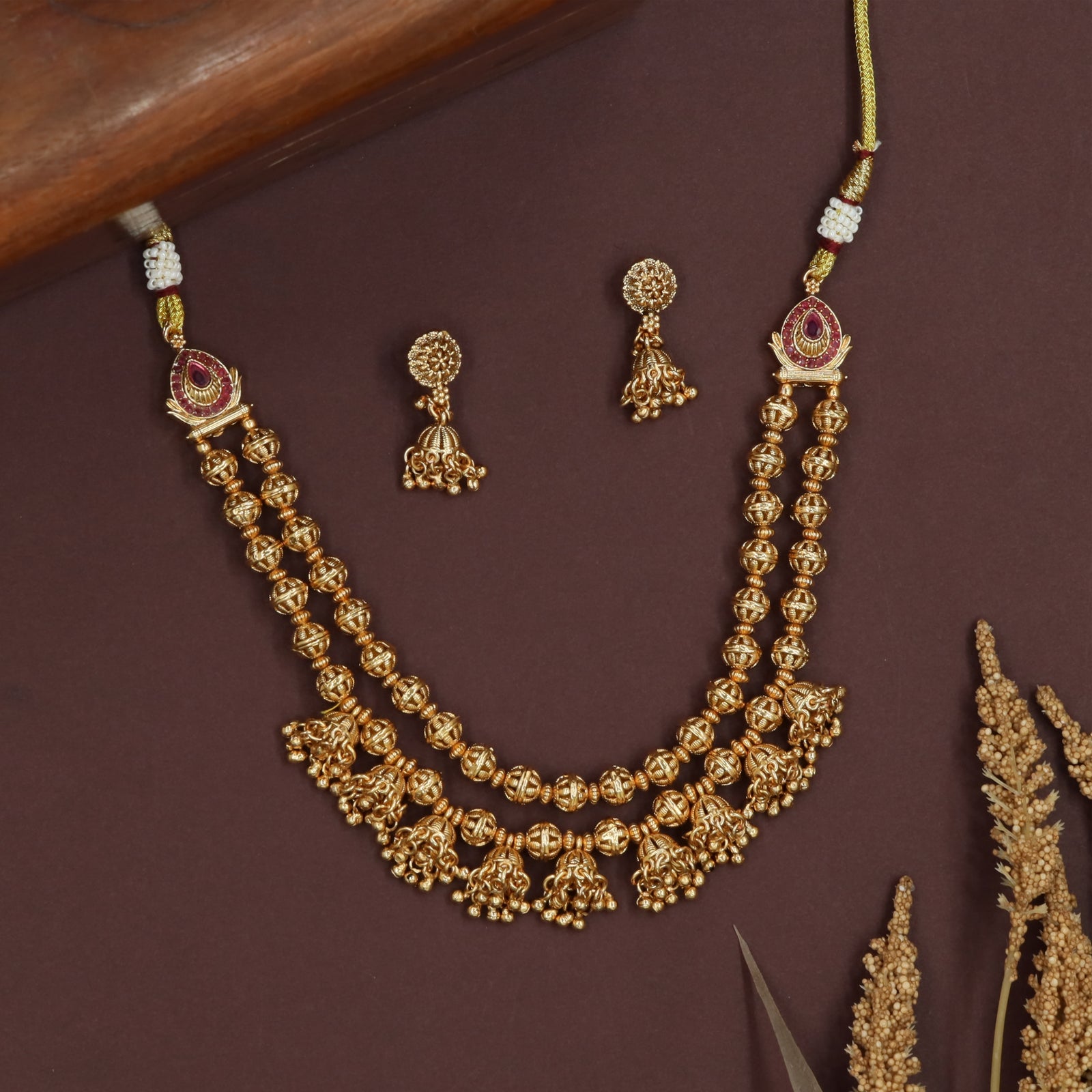 Heavy bead antique beads necklace with dense rows and intricate hanging elements