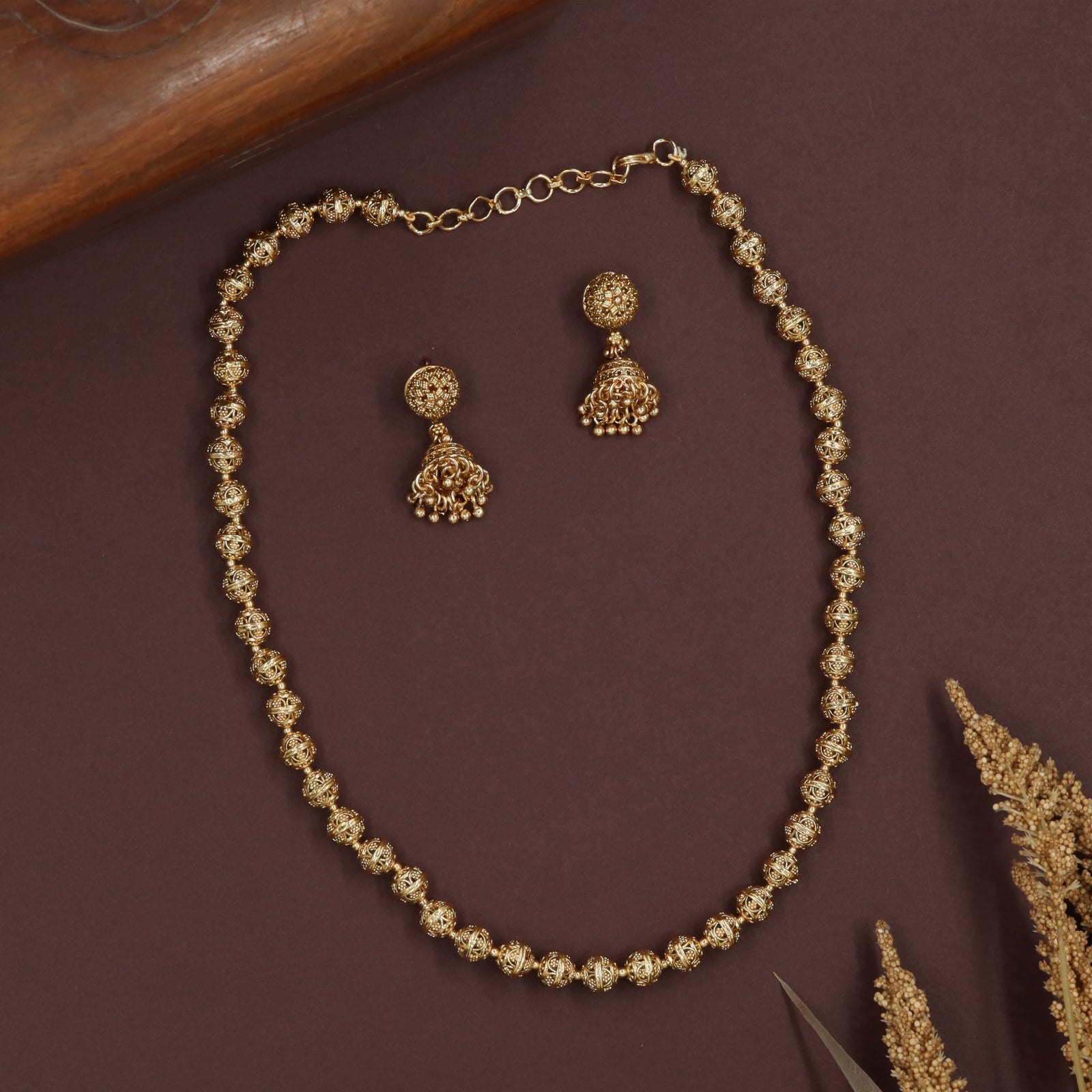 Openwork sphere antique beads necklace with intricately cut bead units and uniform spacing