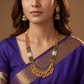 Segmented multi strand antique beads necklace with vertical chain panels