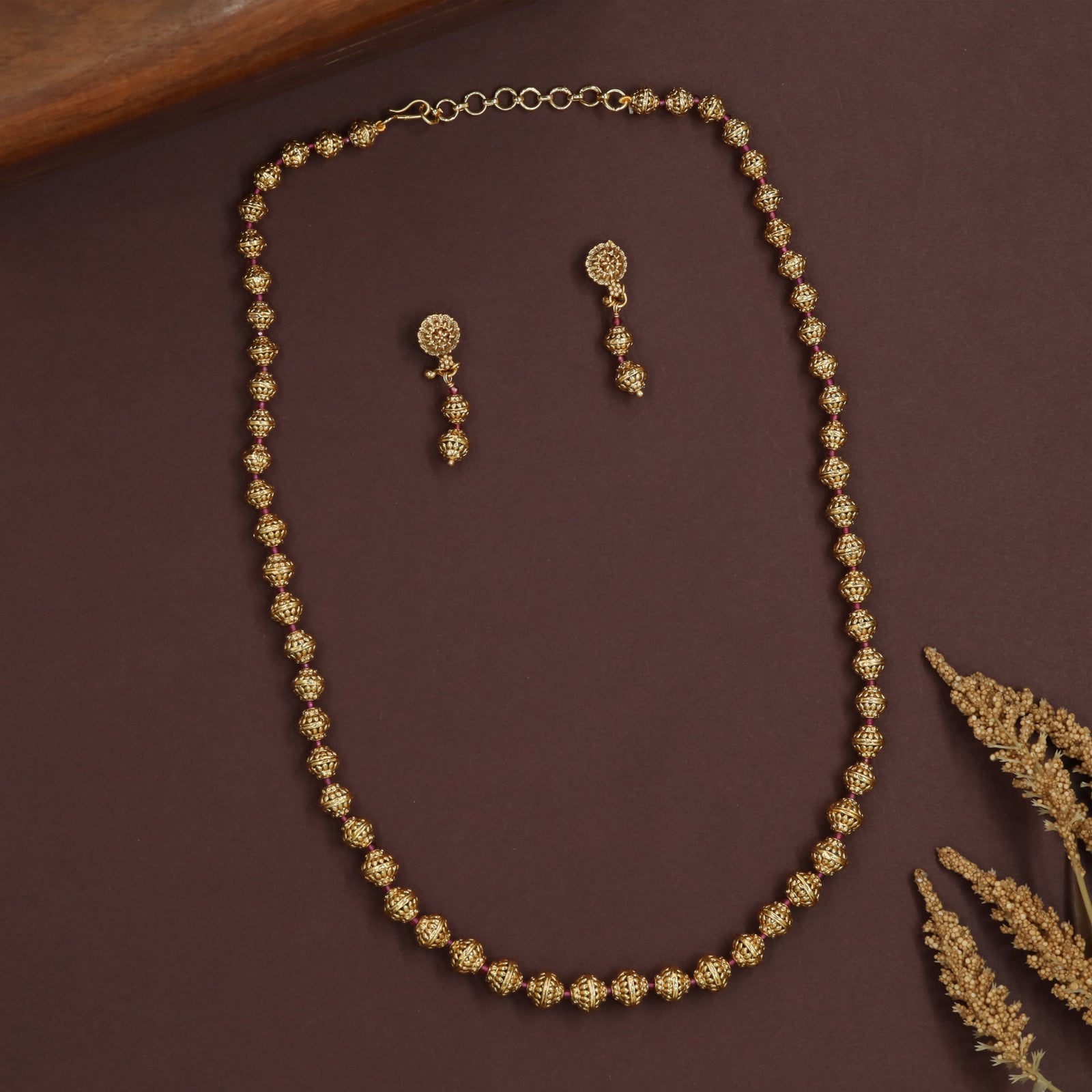 Compact round bead antique beads necklace with detailed textured globes in neat arrangement