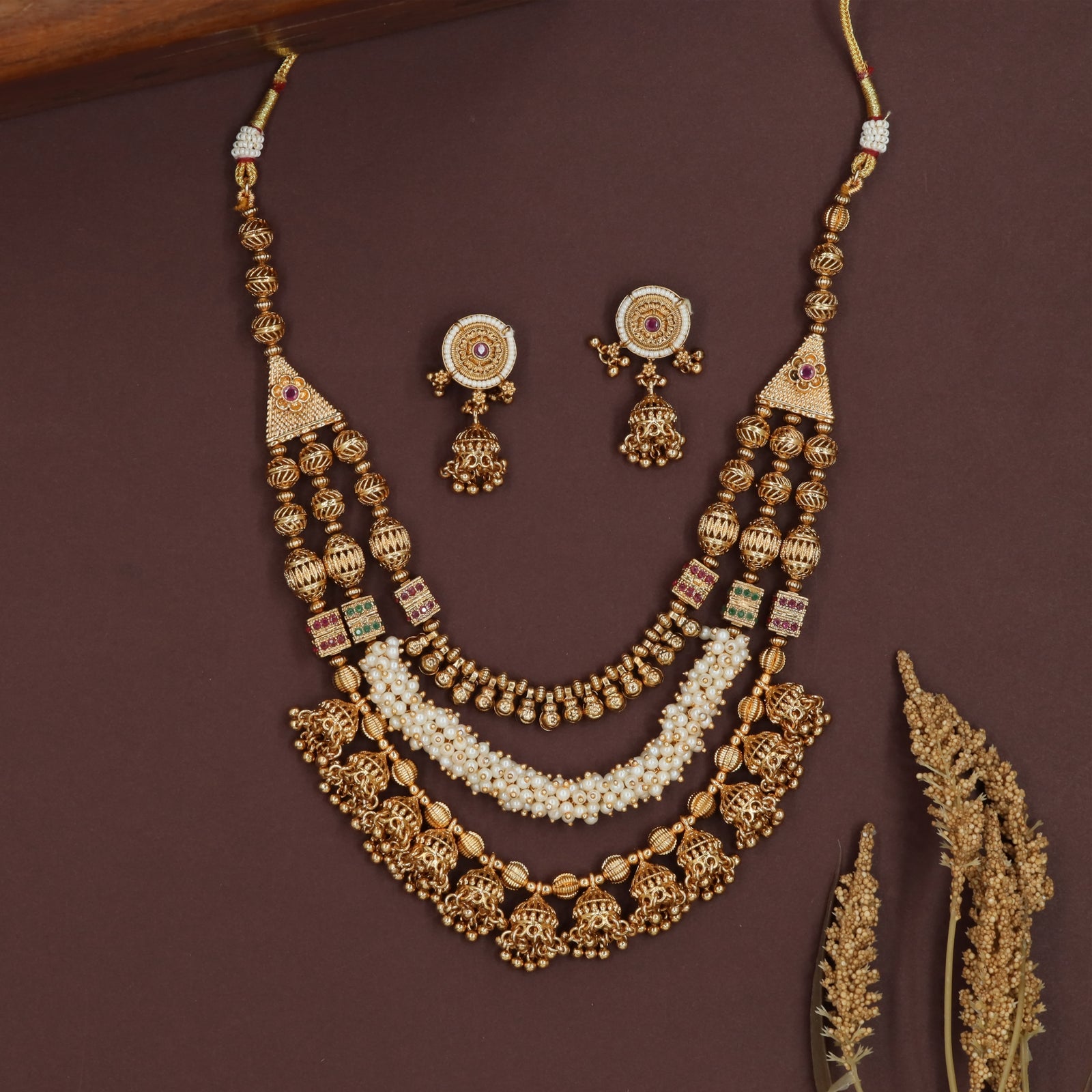 Cascading strand antique necklace with mixed beads and central pearl band