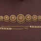 Sunburst medallion waist belt with graduated round panels and layered drop fringe