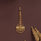 Decorative lakshmi tikka with scroll connectors and fringe bead edging
