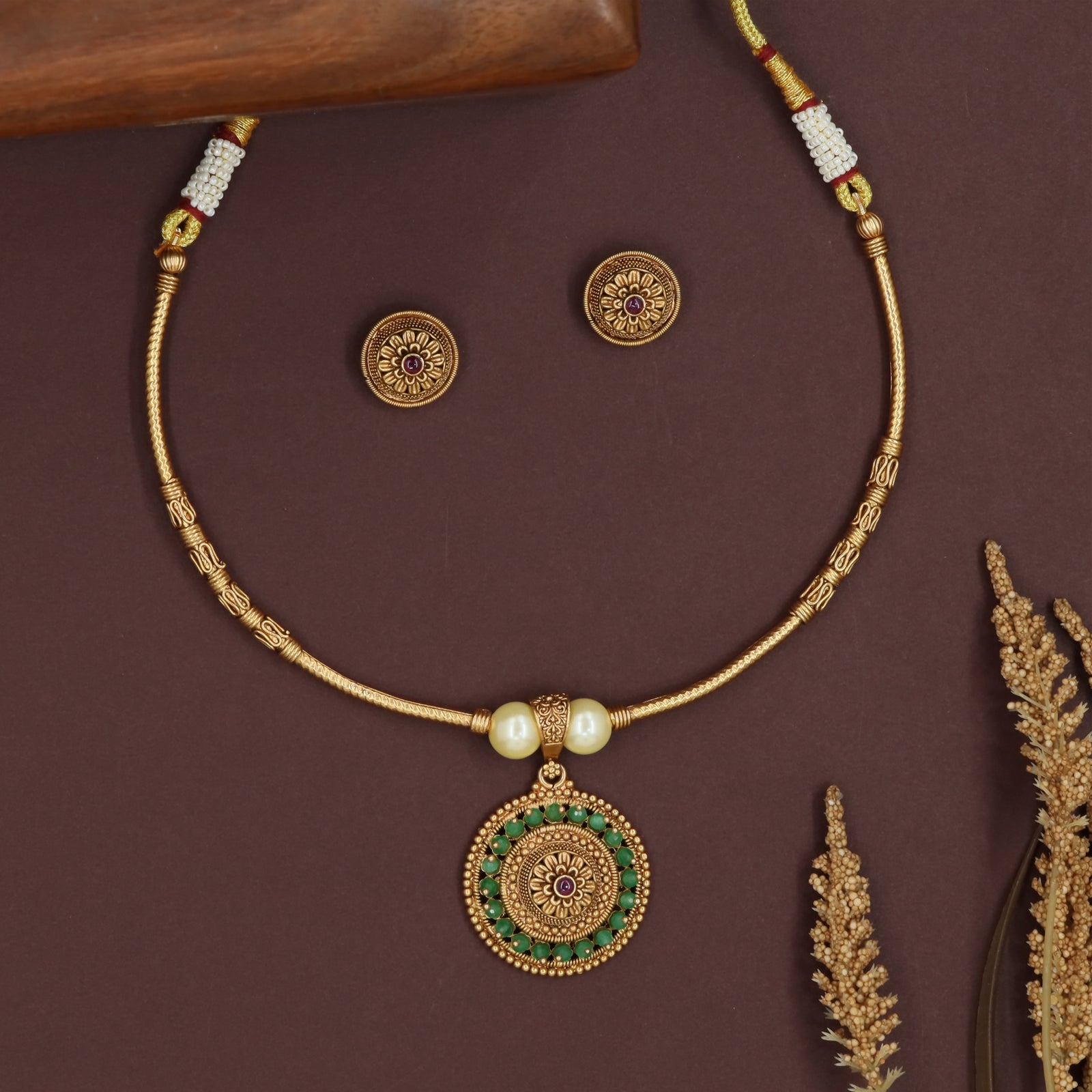 Sleek chain antique necklace with carved segments and circular drop pendant