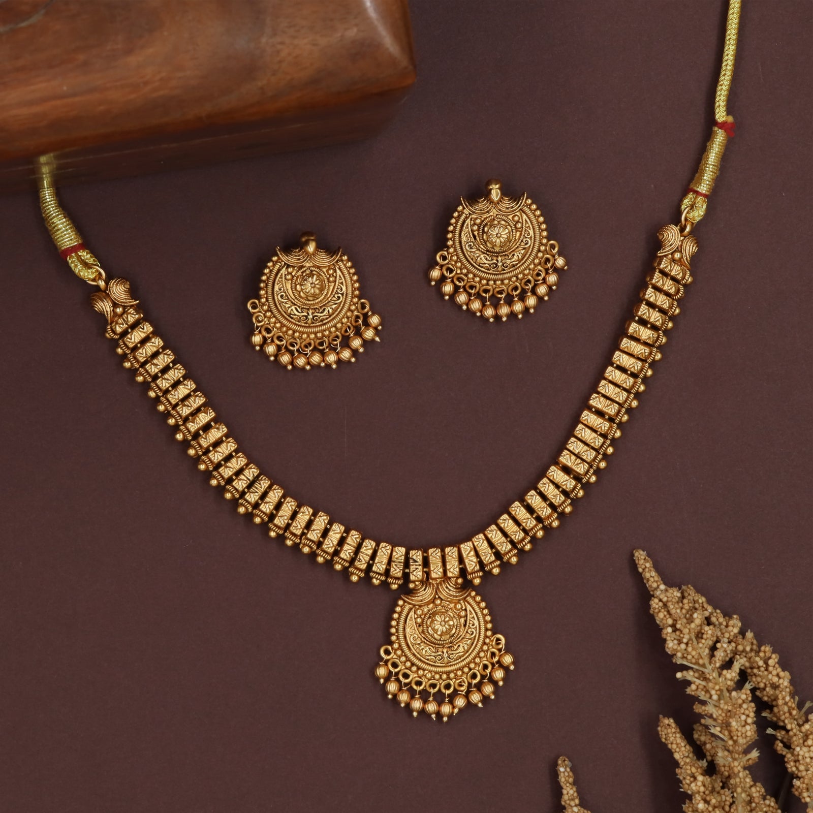 Zigzag panel antique necklace with structured units and hanging medallion fringe
