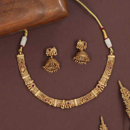 Intricate bar antique necklace with patterned links and repeated elephant units