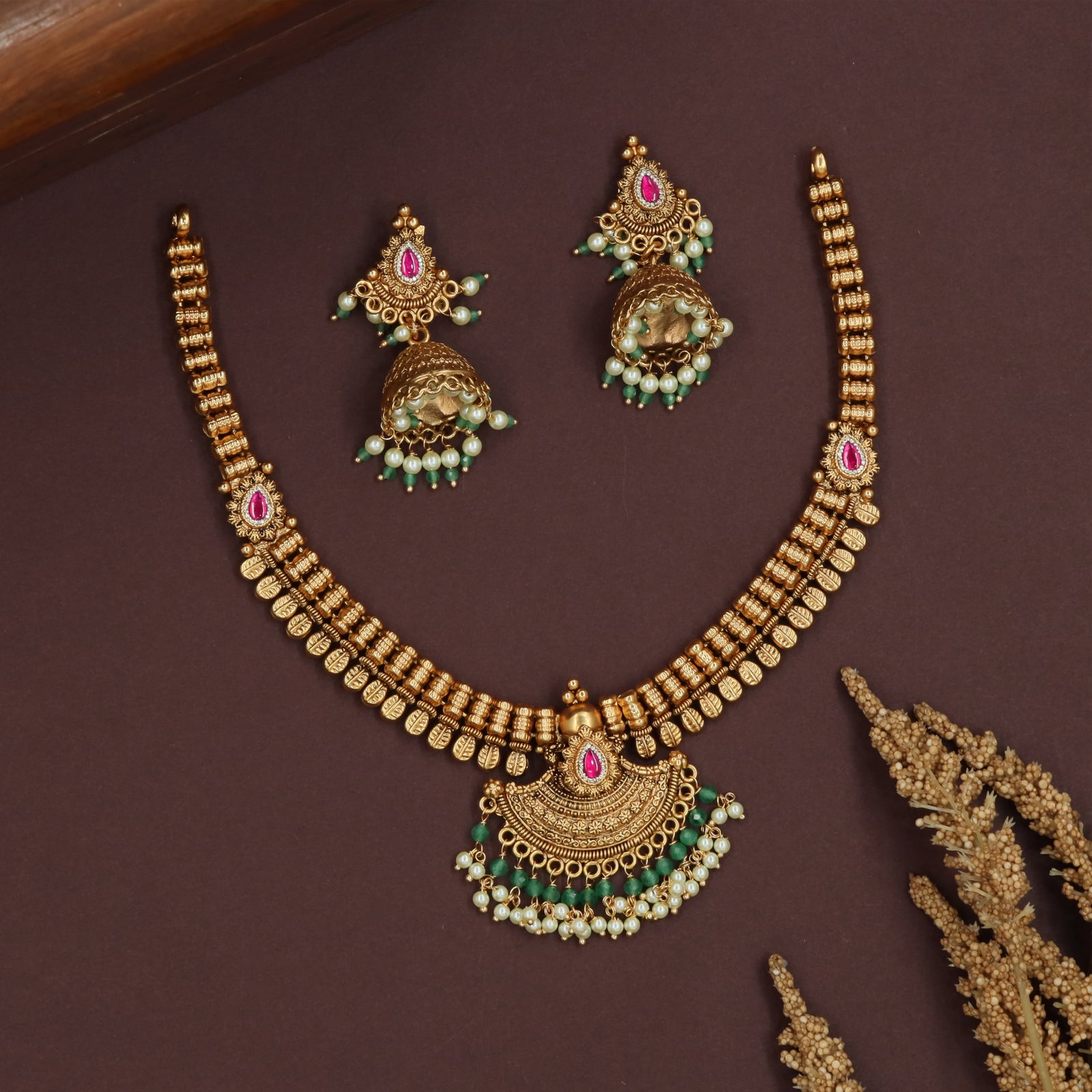 Stacked block antique necklace with compact segments and central pendant fringe