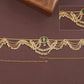 Grand centerpiece waist belt with cascading strands and scalloped chain arches