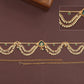 Center pendant waist belt with scalloped pearl drapes and spaced connector discs