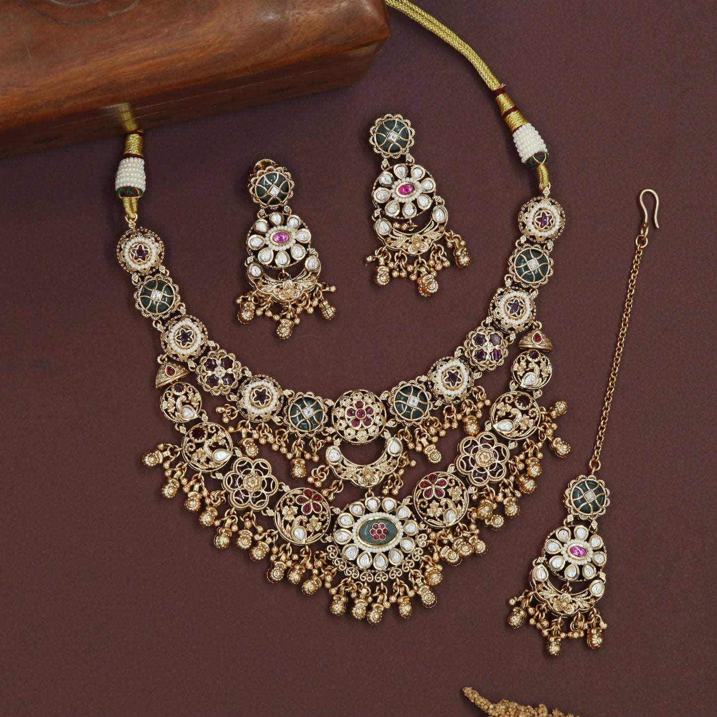 Floral cluster kundan necklace with varied round units and layered drop bunches