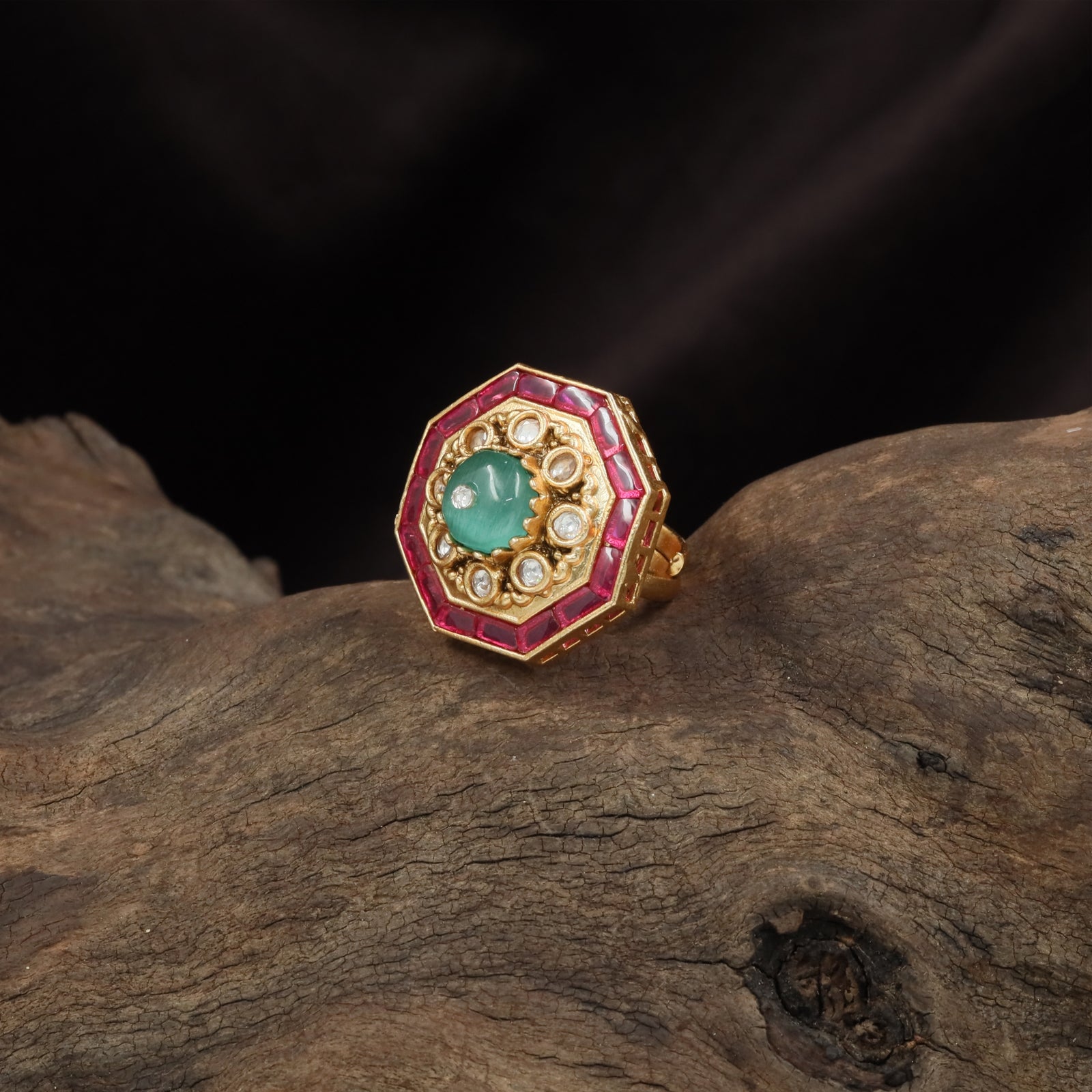 Octagonal frame kundan finger ring with central round cluster and bold border setting