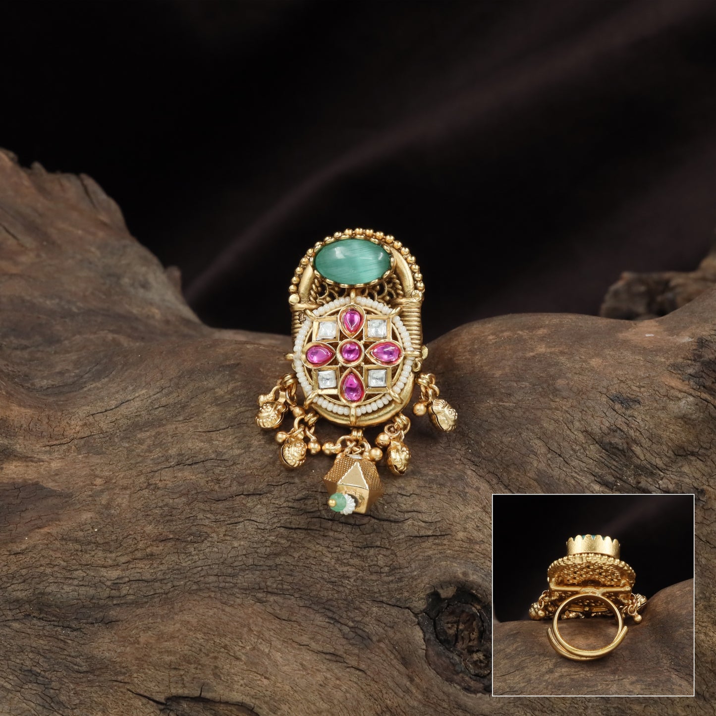 Traditional kundan finger ring with layered sections and hanging drop units
