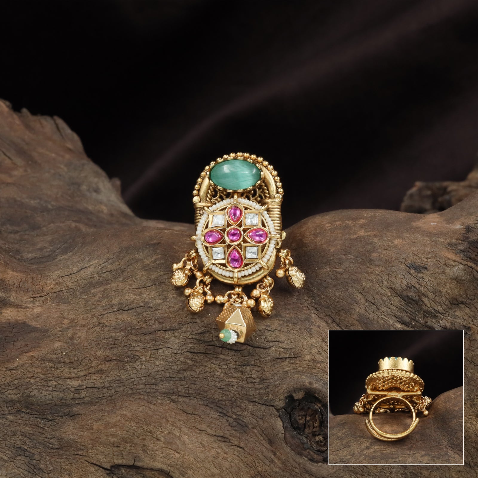 Traditional kundan finger ring with layered sections and hanging drop units